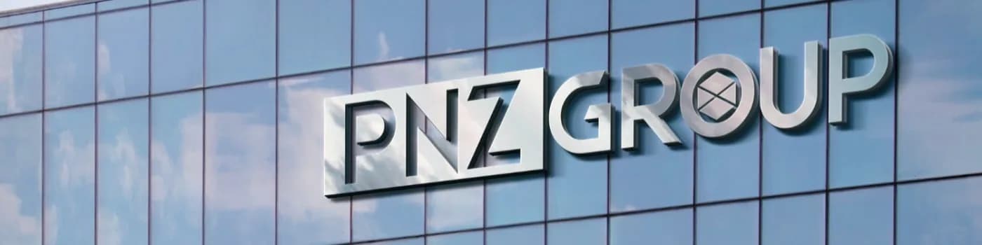 PNZ GROUP sign on a glass-fronted building